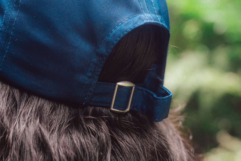 Load image into Gallery viewer, Impact AWARE™ RPET 6-panel sports cap by XD Collection, showing the eco-friendly headwear with curved brim and adjustable strap.
