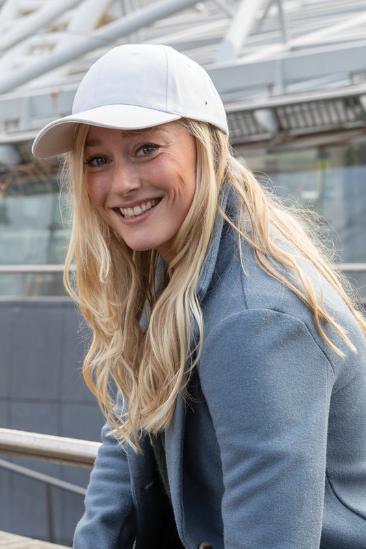 Six-panel XD Collection recycled cotton cap with AWARE™ tracer, featuring a casual headwear design and adjustable fit.
