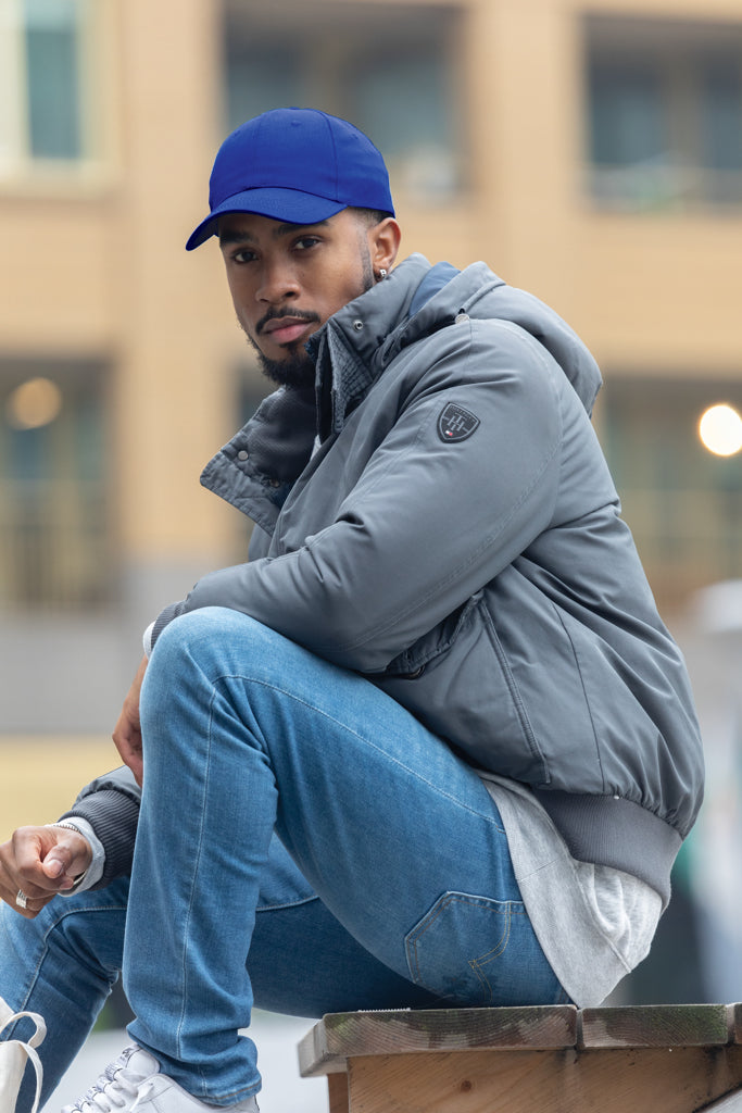 Load image into Gallery viewer, Six-panel recycled cotton cap with AWARE™ tracer from XD Collection, showcasing its breathable fabric and stylish design.
