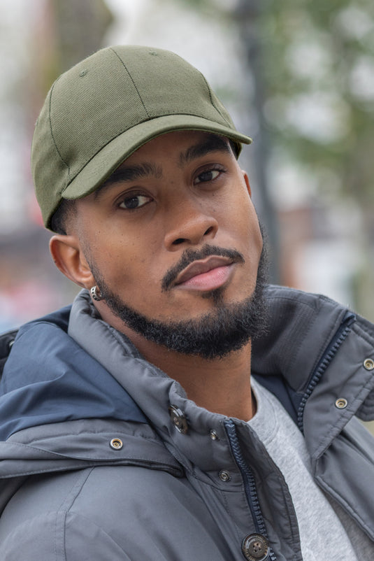 Six-panel recycled cotton cap with AWARE™ tracer from XD Collection, showcasing its casual headwear design and eco-friendly materials.