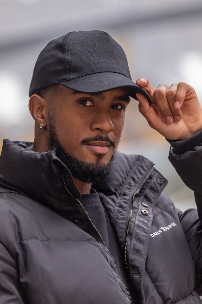 Load image into Gallery viewer, 5-panel recycled cotton cap with AWARE™ tracer from XD Collection, featuring a casual headwear design and eco-friendly materials.
