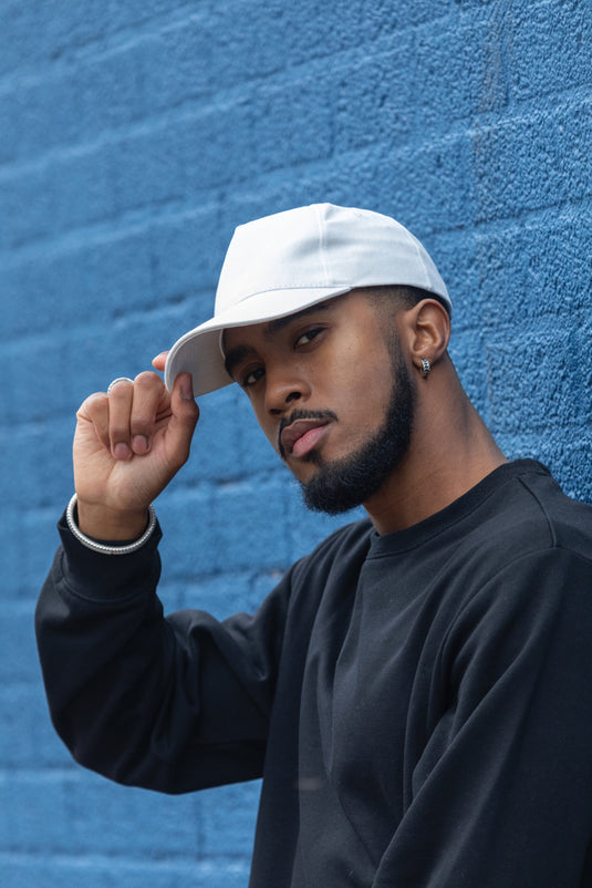 Recycled cotton 5-panel cap from XD Collection with AWARE™ tracer, showcasing eco-friendly headwear design.