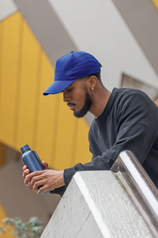 Pink 5-panel recycled cotton cap with AWARE™ tracer from XD Collection, featuring adjustable strap and casual headwear style.