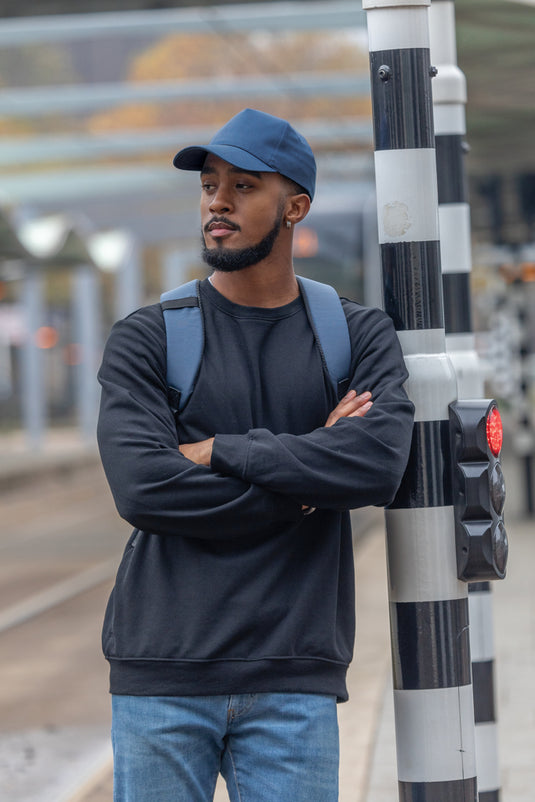 5-panel recycled cotton cap with AWARE™ tracer from XD Collection, featuring a classic headwear design and eco-friendly materials.