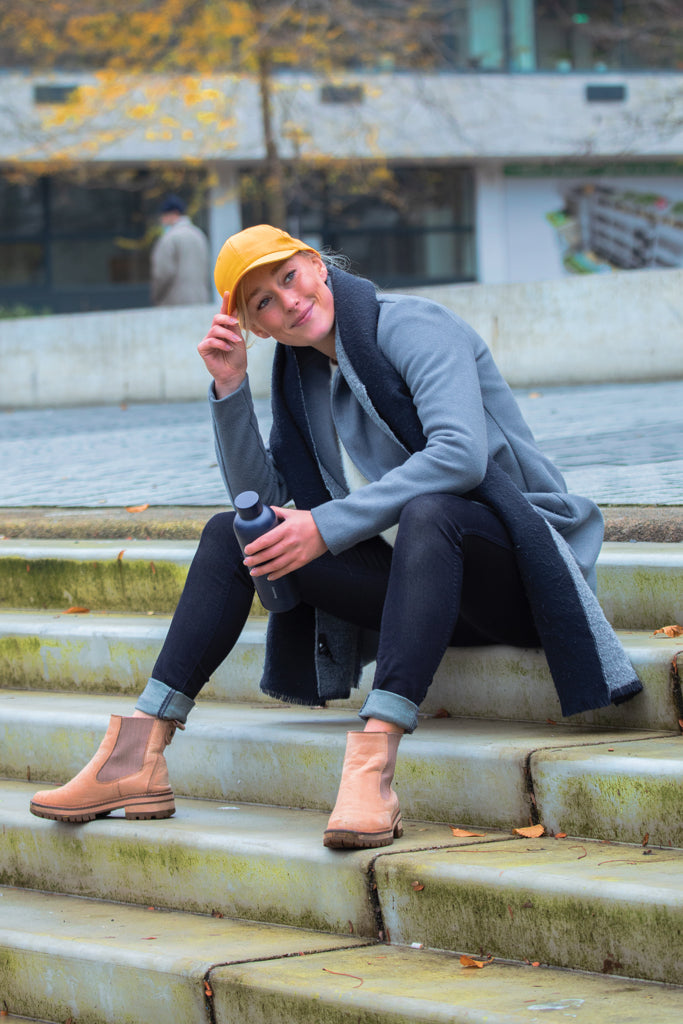Load image into Gallery viewer, Six-panel XD Collection recycled cotton cap with AWARE™ tracer, showcasing adjustable strap and eco-friendly headwear design.
