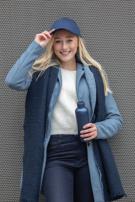 6-panel recycled cotton cap with AWARE™ tracer from XD Collection, showcasing its eco-friendly design and casual headwear style.