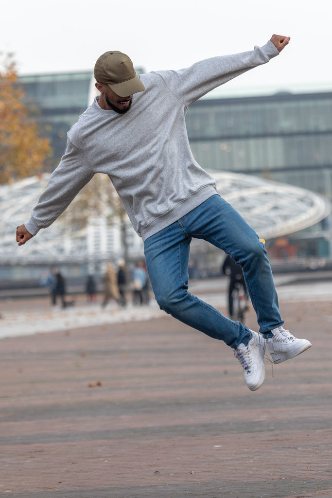 Load image into Gallery viewer, XD Collection Impact 5-panel recycled cotton cap with AWARE™ tracer, showcasing its eco-friendly headwear design and branding.
