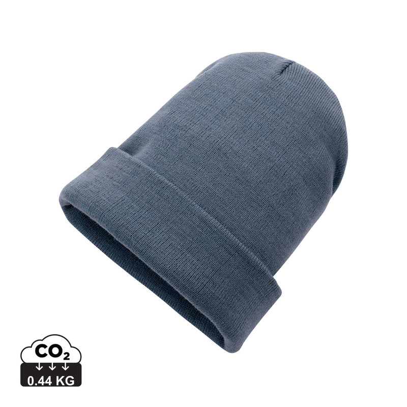 Load image into Gallery viewer, XD Collection Polylana® beanie headwear in soft, knitted fabric, shown in a close-up view highlighting its cozy texture.
