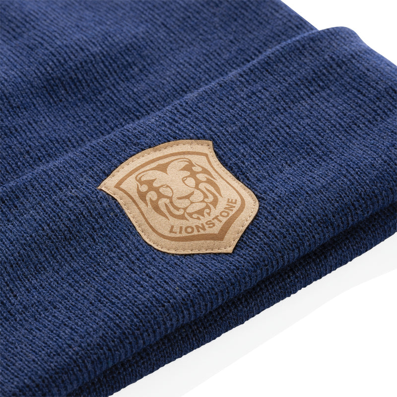 Load image into Gallery viewer, XD Collection Polylana® beanie headwear in black, featuring a snug fit and soft, eco-friendly knit material.
