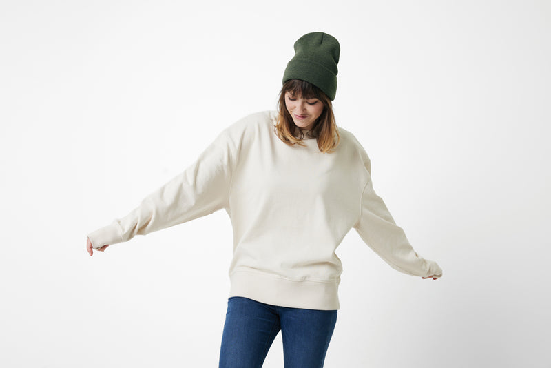 Load image into Gallery viewer, Black Polylana® beanie headwear by XD Collection, soft knitted fabric with a snug fit, suitable for cold weather.
