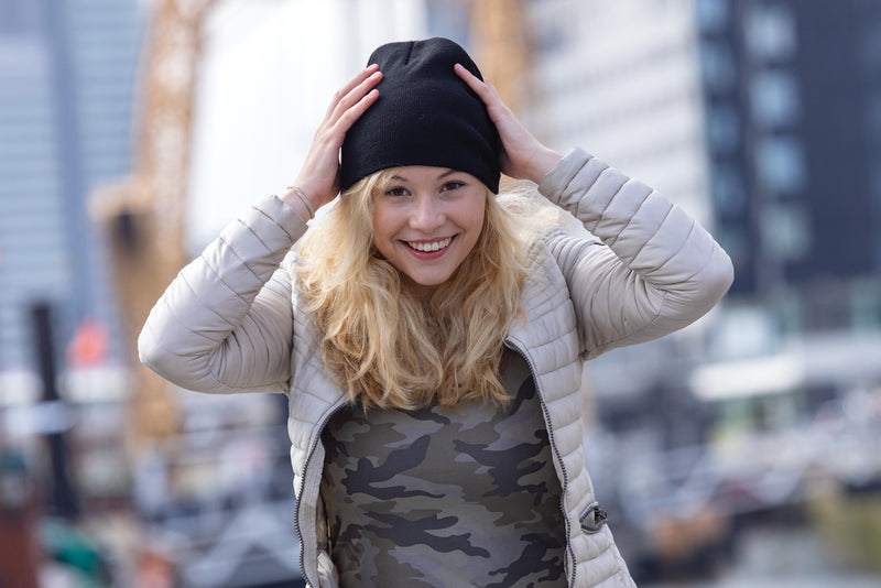 Load image into Gallery viewer, Classic XD Collection beanie made with Polylana® yarn, showcasing a cozy, knitted headwear design in neutral tones.
