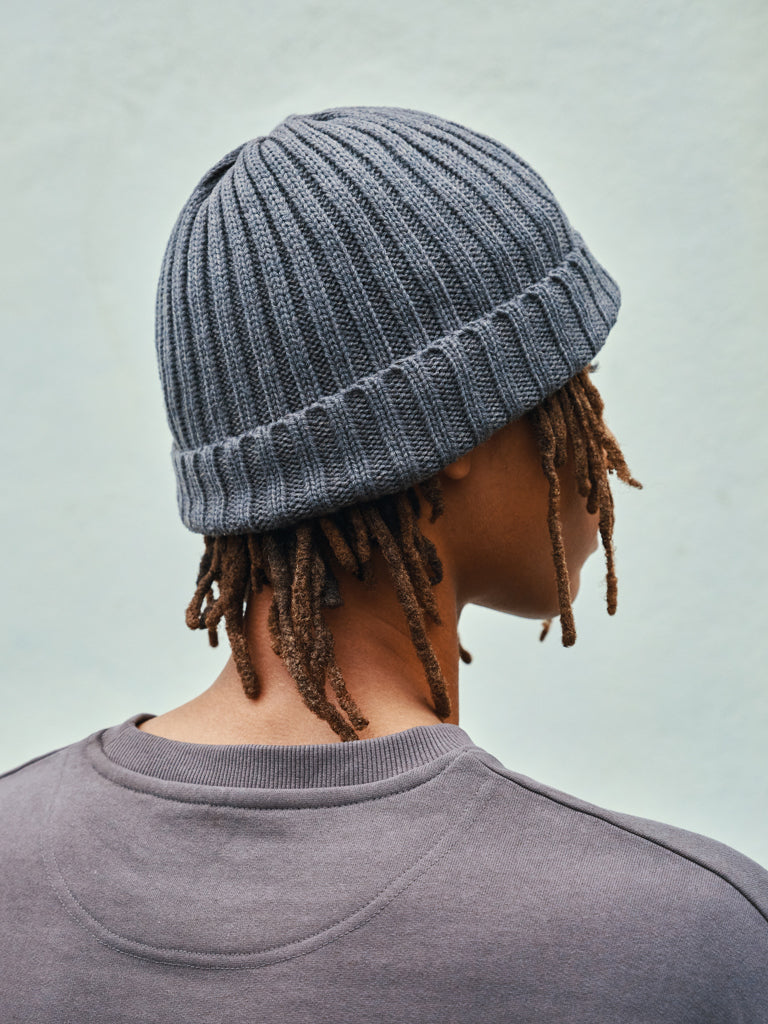 Load image into Gallery viewer, Kennedi AWARE™ Polylana® beanie with large rib pattern, stylish headwear from XD Collection, shown on a model.
