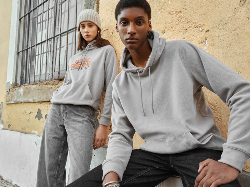 Load image into Gallery viewer, XD Collection Kennedi AWARE™ Polylana® beanie with large rib, cozy headwear showing a knitted design in natural tones.

