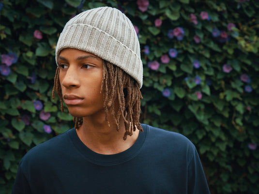 XD Collection Kennedi AWARE™ Polylana® beanie with large rib knit, soft headwear in a cozy, stylish design.