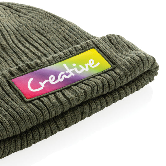 Impact AWARE™ Polylana® double knitted beanie by XD Collection, showcasing a cozy, double-layered headwear in natural tones.