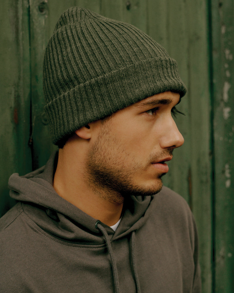 Load image into Gallery viewer, Impact AWARE™ Polylana® double knitted beanie from XD Collection, showing its cozy, textured headwear with a folded brim.
