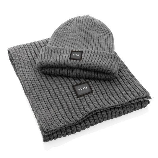 Impact AWARE™ Polylana® knitted scarf by XD Collection, headwear in natural beige with a textured knit pattern, measuring 180x25cm.