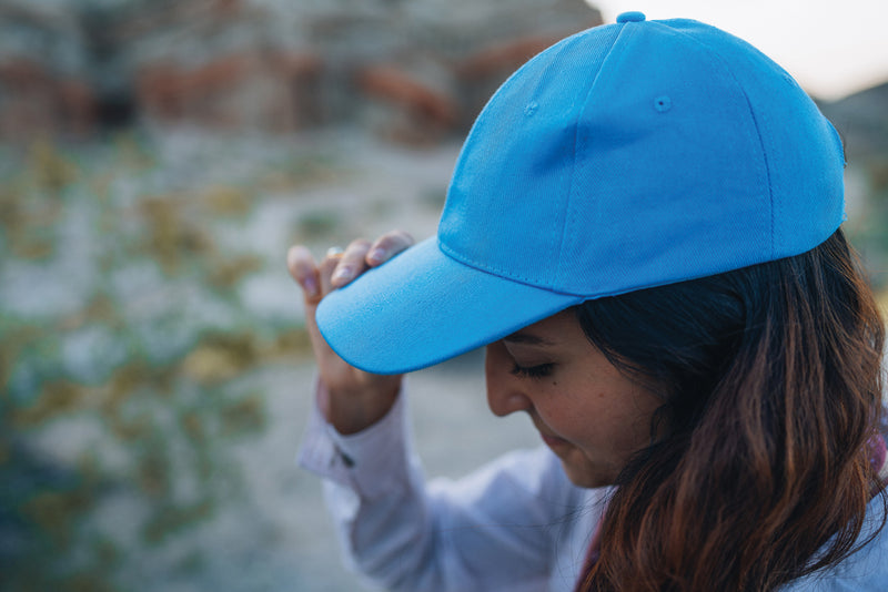 Load image into Gallery viewer, Six-panel XD Collection recycled cotton cap with AWARE™ tracer, featuring a casual headwear design and adjustable strap.
