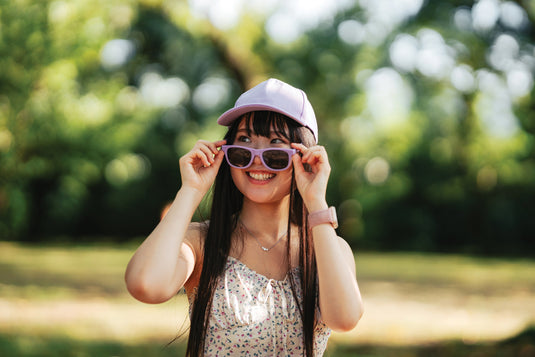 XD Collection 5-panel recycled cotton cap with AWARE™ tracer, showcasing the eco-friendly headwear design and adjustable strap.