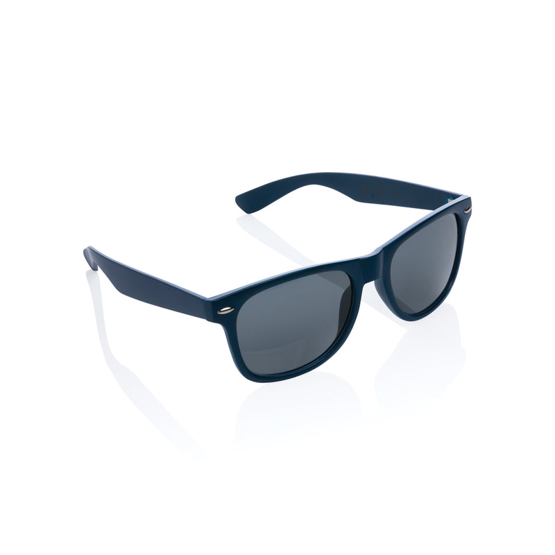 Load image into Gallery viewer, Pair of XD Collection GRS recycled PC plastic outdoor sunglasses with a sleek frame and tinted lenses.

