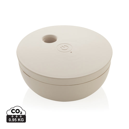 XD Collection Breevia RCS rechargeable floating humidifier for home and living, shown in use with water and mist.
