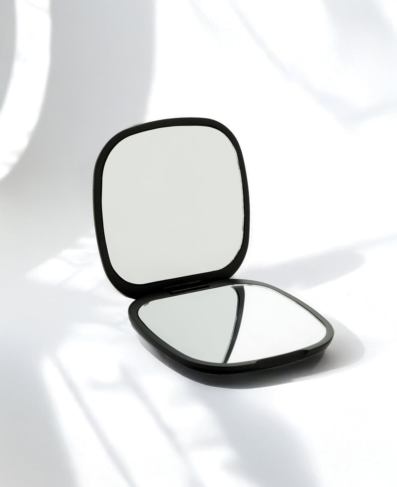Load image into Gallery viewer, Reflecta RCS recycled plastic makeup mirror by XD Collection, round compact with reflective surface for beauty and grooming.
