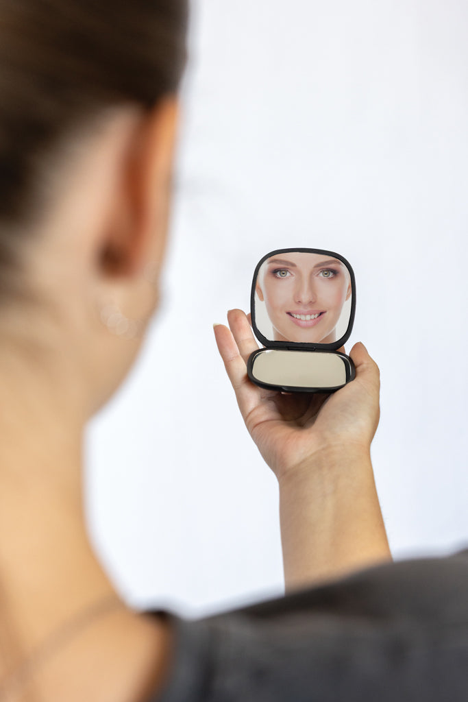 Load image into Gallery viewer, Reflecta RCS recycled plastic makeup mirror by XD Collection, compact home beauty mirror with reflective surface.
