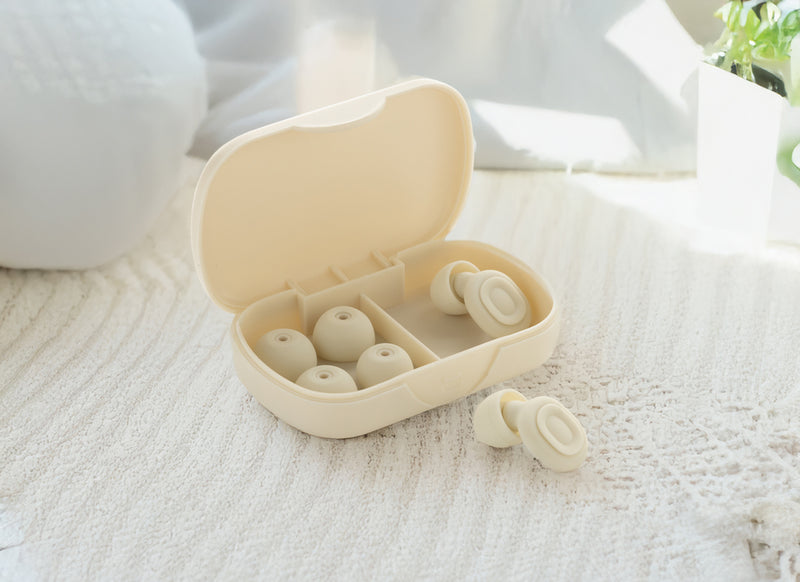 Load image into Gallery viewer, XD Collection Sereva noise-reducing earplugs for home and living, shown in a close-up image with soft silicone tips.
