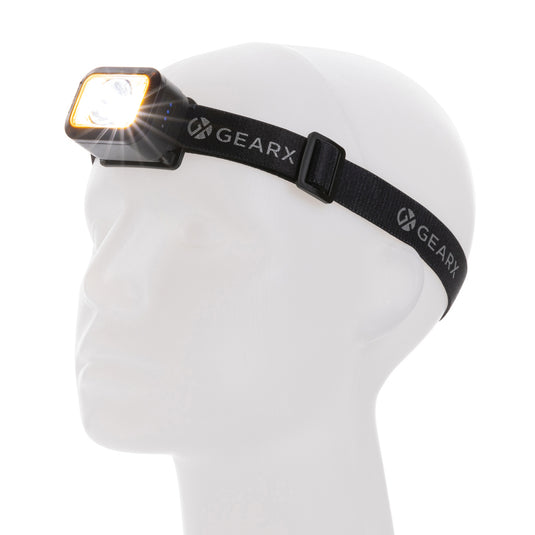 GearX Gear X RCS plastic heavy-duty head torch with adjustable strap and bright LED light for outdoor and work use.