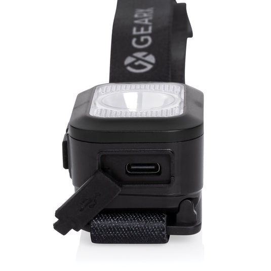 GearX Gear X RCS plastic heavy-duty head torch with adjustable strap and bright LED light for outdoor and work use.