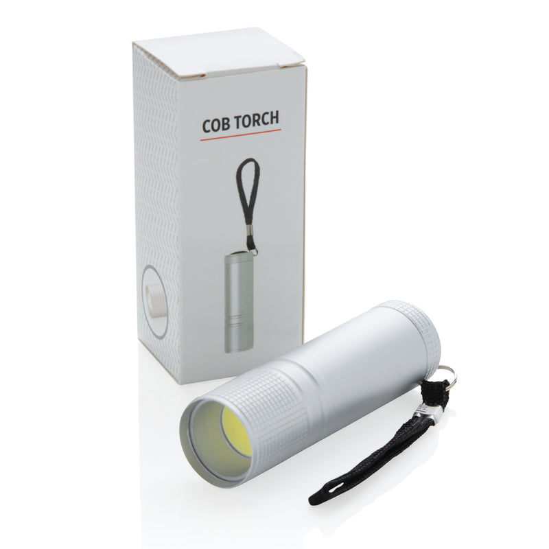 Load image into Gallery viewer, XD Collection COB torch in black with ergonomic grip, suitable for tools and lighting applications, shown on a plain background.

