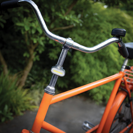 XD Collection Lumino RCS recycled plastic USB rechargeable bike light set with LED lights and mounting brackets for safety.