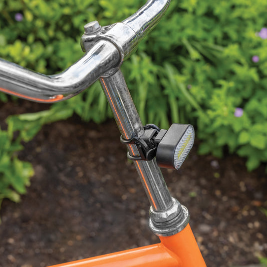 XD Collection Lumino RCS recycled plastic USB rechargeable bike light set with bright LED lights and durable mounting brackets.