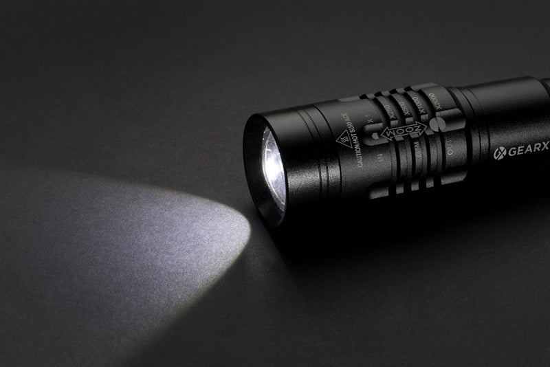 Load image into Gallery viewer, Gear X USB rechargeable torch with bright LED light, compact tool for outdoor and emergency use, in black with ergonomic handle.
