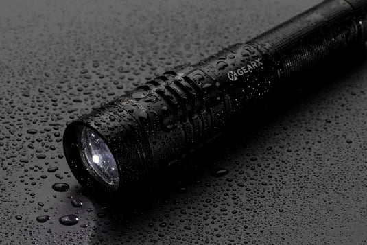 GearX USB rechargeable torch with bright LED light, compact design, and durable body for outdoor and emergency use.