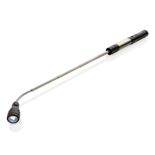 Large telescopic LED torch with COB light from XD Collection, showing the adjustable extendable handle and bright illumination.