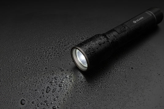 GearX recycled aluminum heavy-duty USB-rechargeable torch with LED light, rugged design, and ergonomic handle.