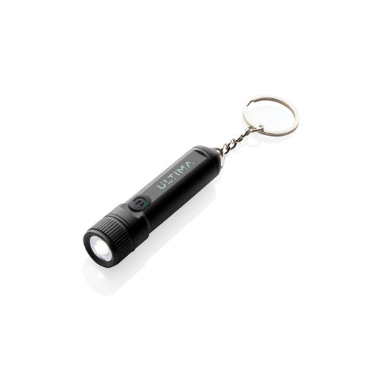 Gear X rechargeable ultra-bright keychain torch showing compact silver design with LED light and keyring attachment for portable illumination.