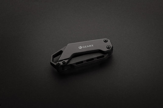 Gear X screwdriver tool from the Tools & Torches collection, shown with a close-up of its ergonomic handle and metal tip.