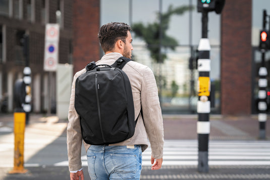 XD Design Flex Gym Bag in black with multiple compartments, durable straps, suitable for travel and gym use.
