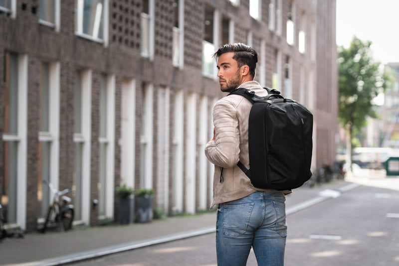 Load image into Gallery viewer, XD Design Flex Gym bag in black with adjustable shoulder strap and multiple compartments for sports and travel needs.
