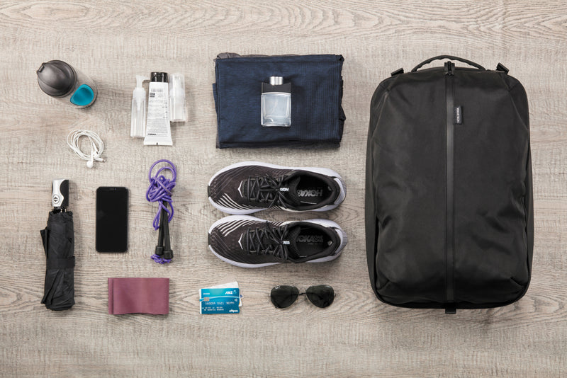 Load image into Gallery viewer, XD Design Flex Gym Bag in black with adjustable shoulder strap and multiple compartments for travel and gym essentials.
