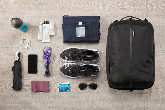 XD Design Flex Gym Bag in black with adjustable shoulder strap and multiple compartments for travel and gym essentials.