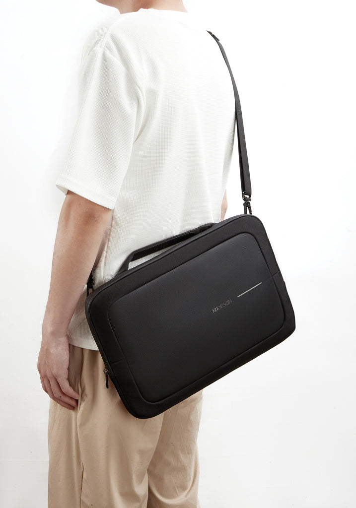 Load image into Gallery viewer, XD Design 14-inch laptop bag in black with padded compartment and adjustable shoulder strap, designed for travel and everyday use.

