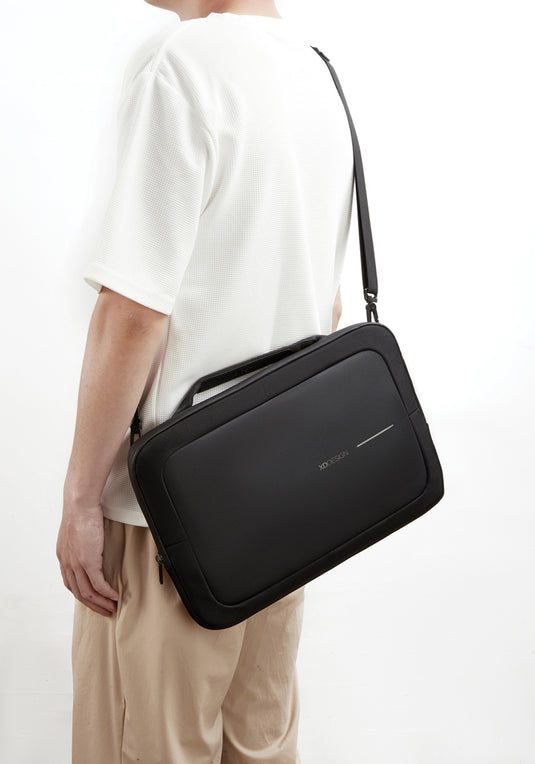XD Design 14-inch laptop bag in black with padded compartment and adjustable shoulder strap, designed for travel and everyday use.
