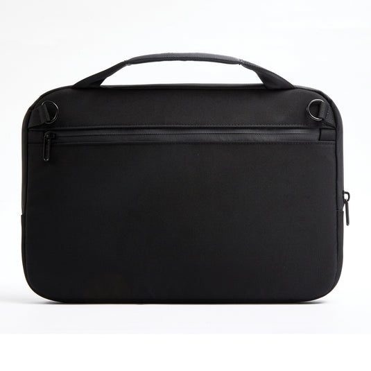 XD Design 14-inch laptop bag with padded compartment, black nylon exterior, and adjustable shoulder strap for travel and daily use.
