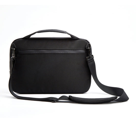 Black XD Design 14-inch laptop bag with padded shoulder strap and front zipper pocket, made of durable synthetic material.