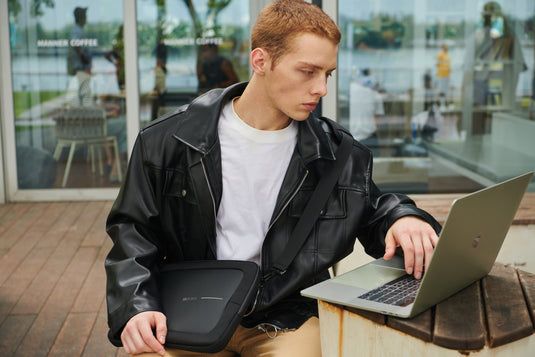 XD Design 14-inch laptop bag with padded compartments and adjustable shoulder strap, made from durable, stylish materials.