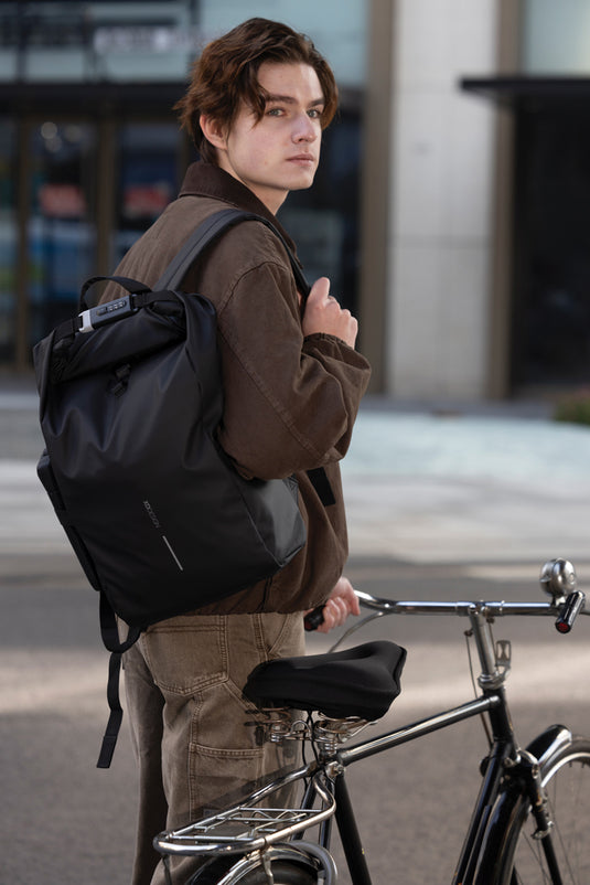 Urban water-resistant bike backpack from XD Design featuring multiple compartments and adjustable straps for cycling convenience.