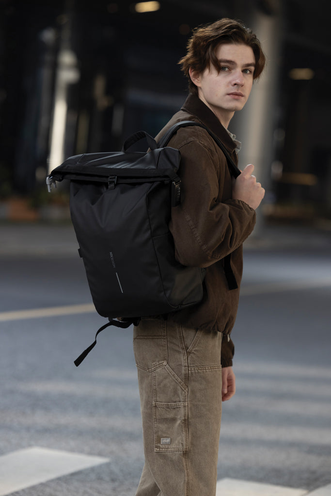 Load image into Gallery viewer, Water-resistant bike backpack by XD Design featuring multiple compartments and reflective details for urban commuting.
